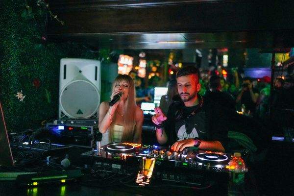 Live set with a vocalist in green light
